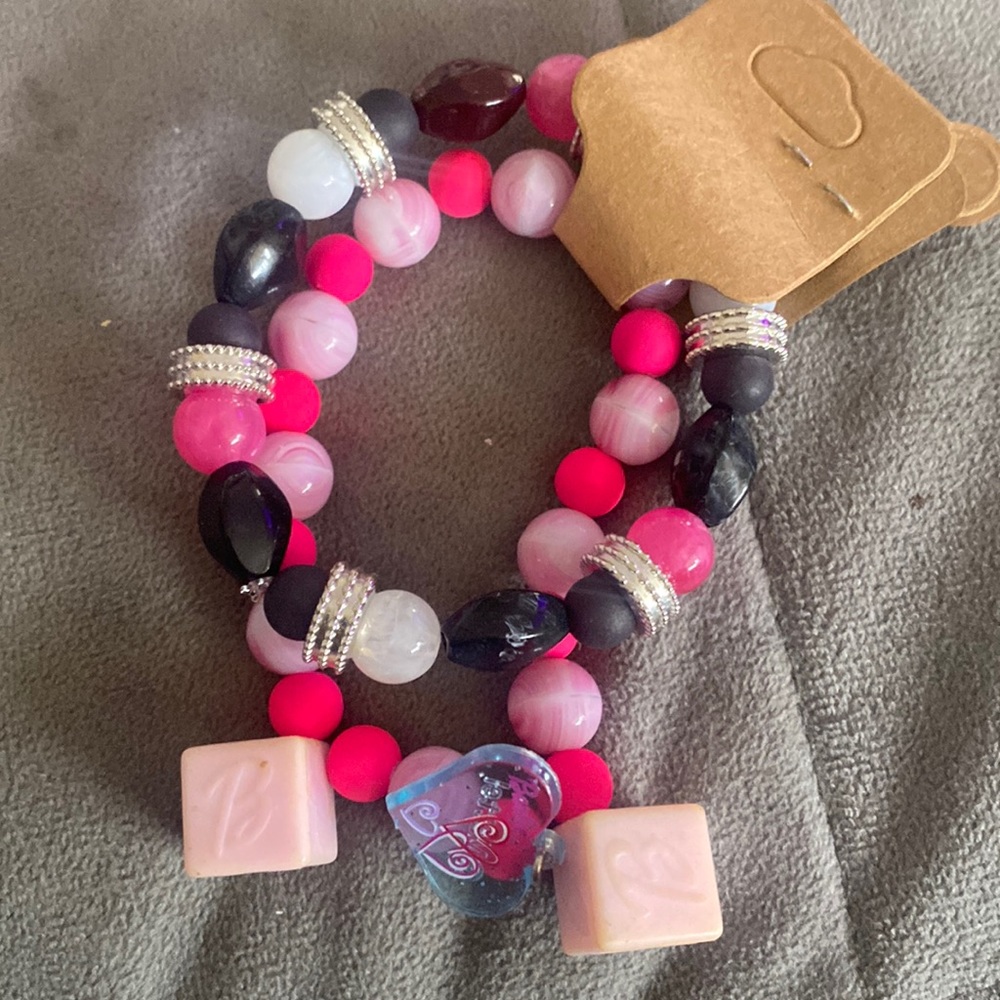 Bundle of two beaded bracelets, Barbie colors with spacers glass beads and